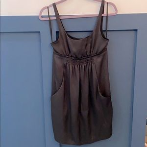 Black dress with scoop neck and pockets